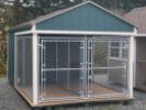 Pine Creek 8x14 Double Dog Kennel with Hunter Green walls, Navajo White trim, and Barkwood shingles